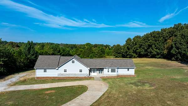 10.1 Acres of Land with Home for Sale in Sulphur Rock, Arkansas