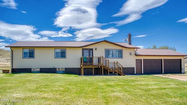 64.4 Acres of Agricultural Land with Home for Sale in Moorcroft, Wyoming