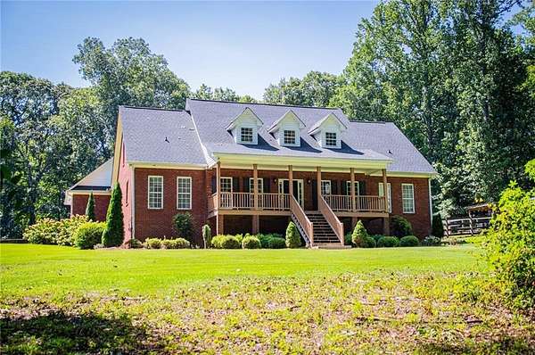 6.77 Acres of Land with Home for Sale in Temple, Georgia