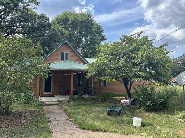 17.4 Acres of Land with Home for Sale in Long Lane, Missouri
