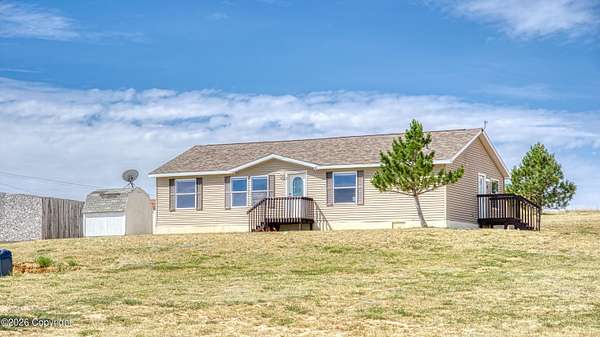 5 Acres of Land with Home for Sale in Gillette, Wyoming