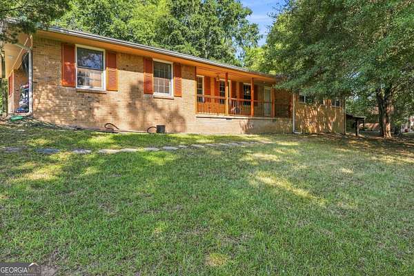 2.78 Acres of Land with Home for Sale in Lithonia, Georgia