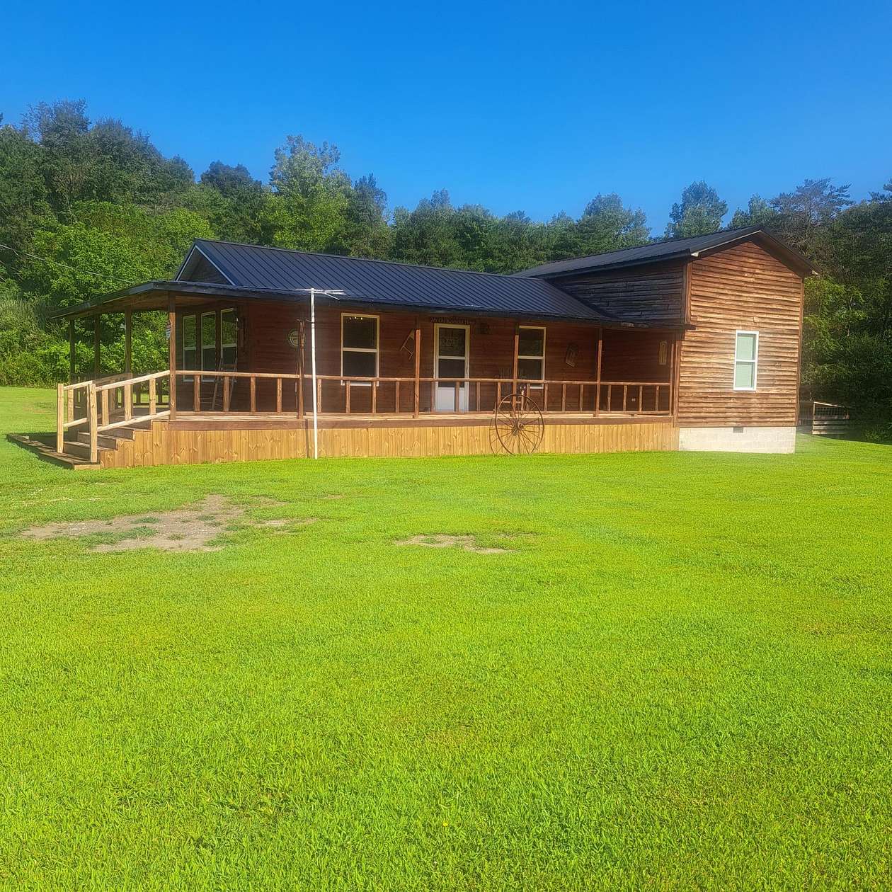 12.2 Acres of Land with Home for Sale in Manchester, Kentucky