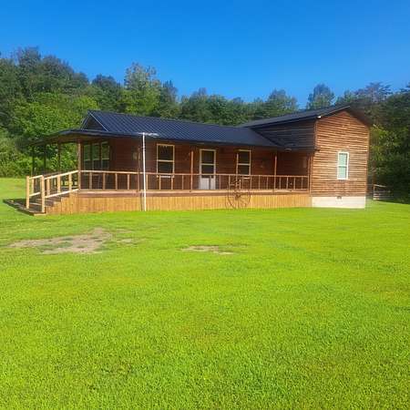 12.2 Acres of Land with Home for Sale in Manchester, Kentucky