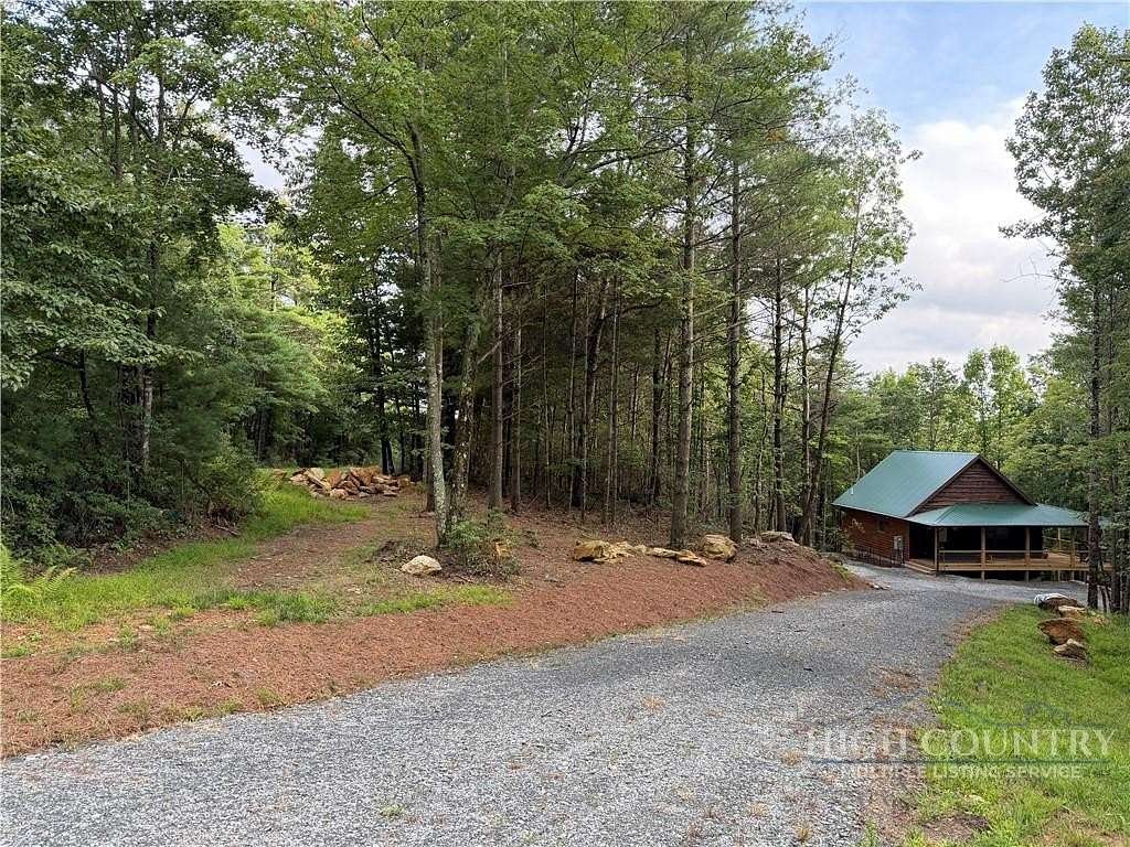 10.6 Acres of Recreational Land with Home for Sale in Glade Valley, North Carolina