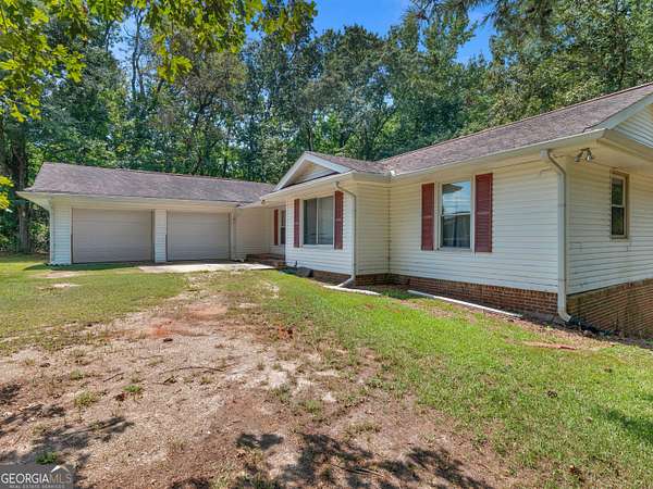 1.79 Acres of Land with Home for Sale in Stockbridge, Georgia