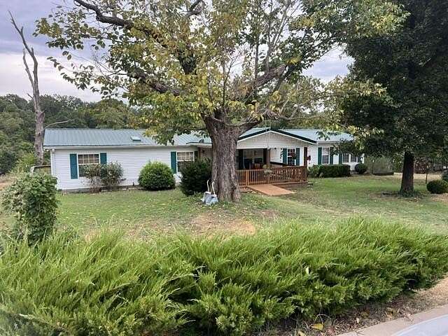 16 Acres of Land with Home for Sale in Wyandotte, Oklahoma