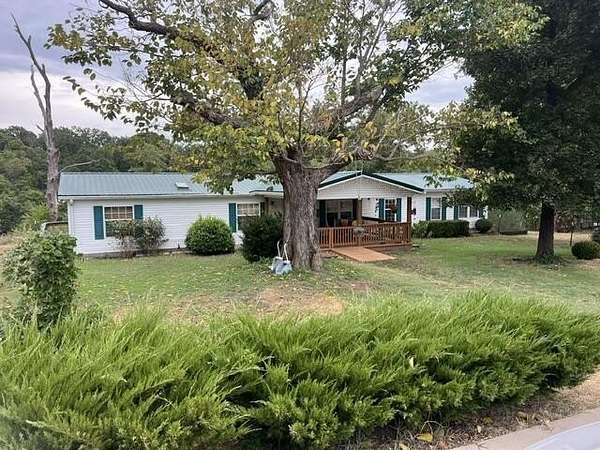 16 Acres of Land with Home for Sale in Wyandotte, Oklahoma
