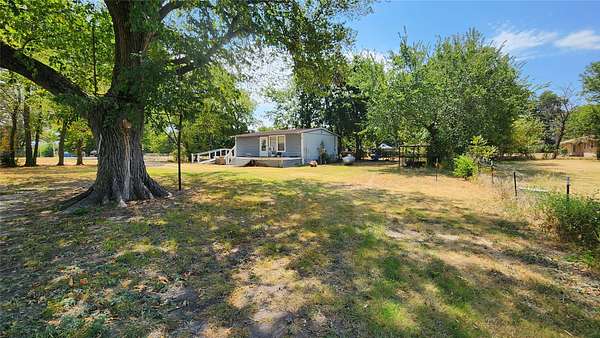 5.25 Acres of Land with Home for Sale in Lone Oak, Texas