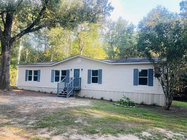 4.9 Acres of Land with Home for Sale in Carriere, Mississippi