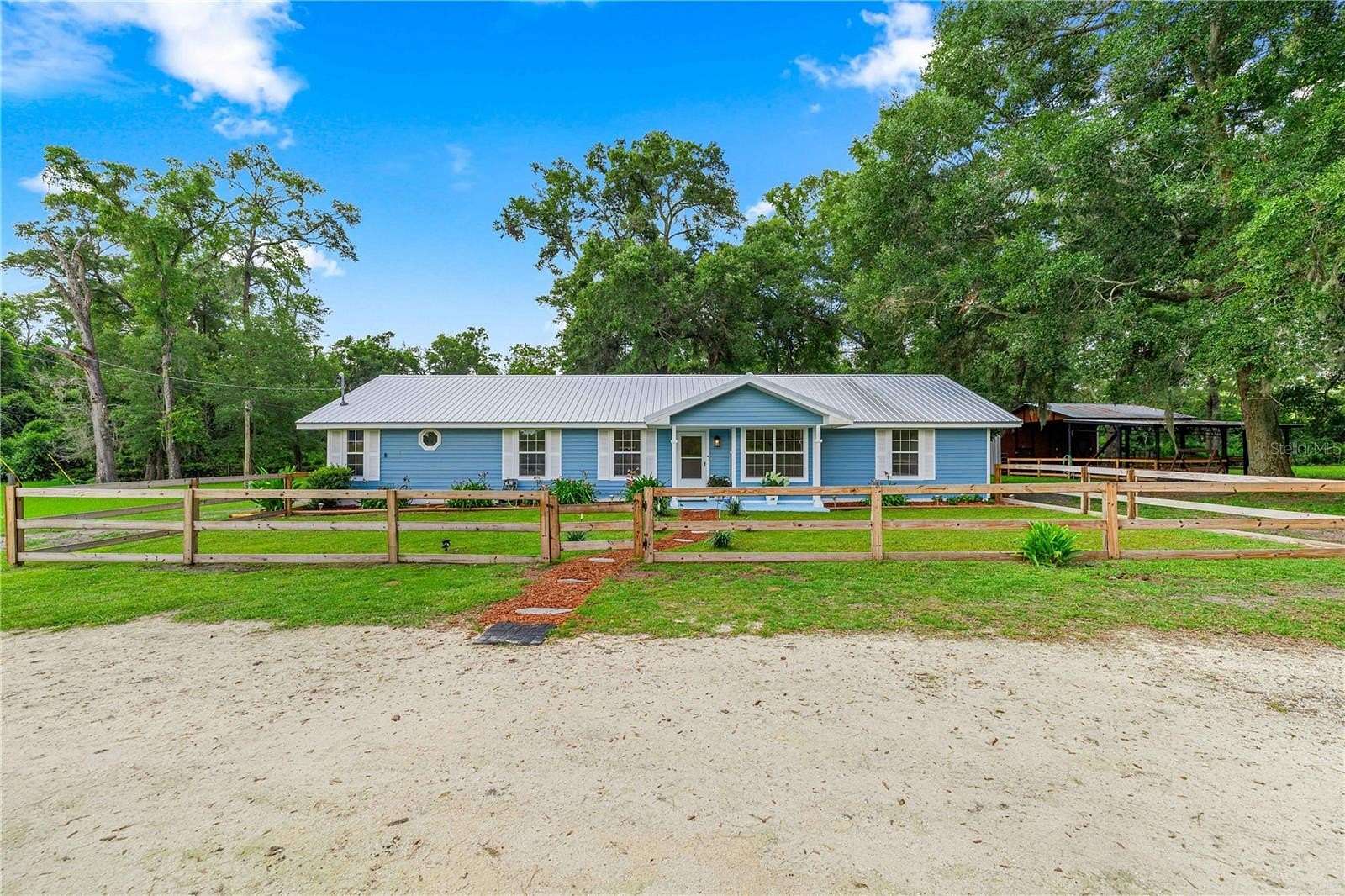 12.5 Acres of Land with Home for Sale in Trenton, Florida