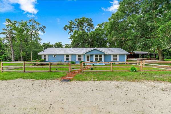 12.5 Acres of Land with Home for Sale in Trenton, Florida