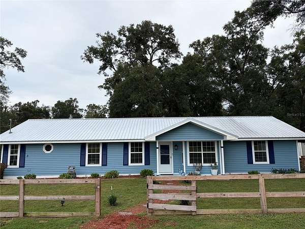 12.5 Acres of Land with Home for Sale in Trenton, Florida