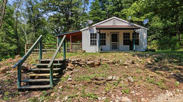 38.1 Acres of Land with Home for Sale in Mountain Grove, Missouri