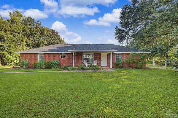 1.53 Acres of Land with Home for Sale in Pace, Florida