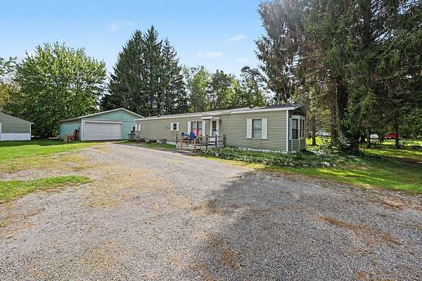 18 Acres of Recreational Land with Home for Sale in Leslie, Michigan