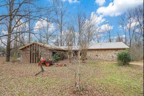 3.55 Acres of Land with Home for Sale in Adamsville, Tennessee
