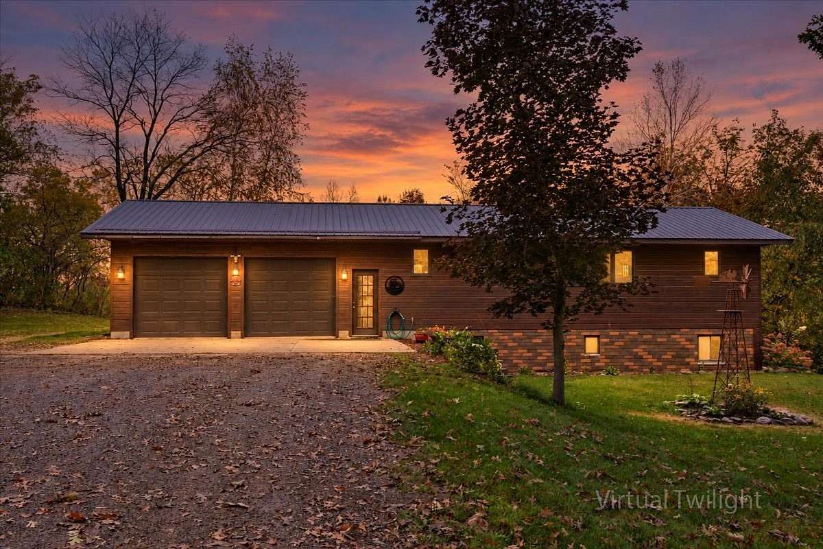 25.1 Acres of Recreational Land with Home for Sale in Knapp, Wisconsin