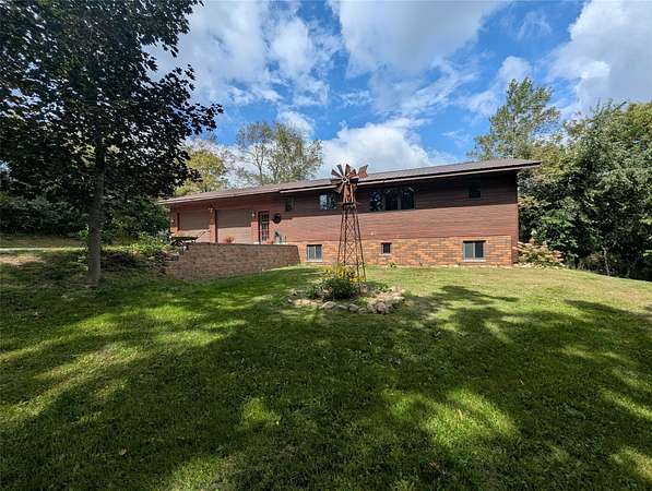25.1 Acres of Recreational Land with Home for Sale in Knapp, Wisconsin