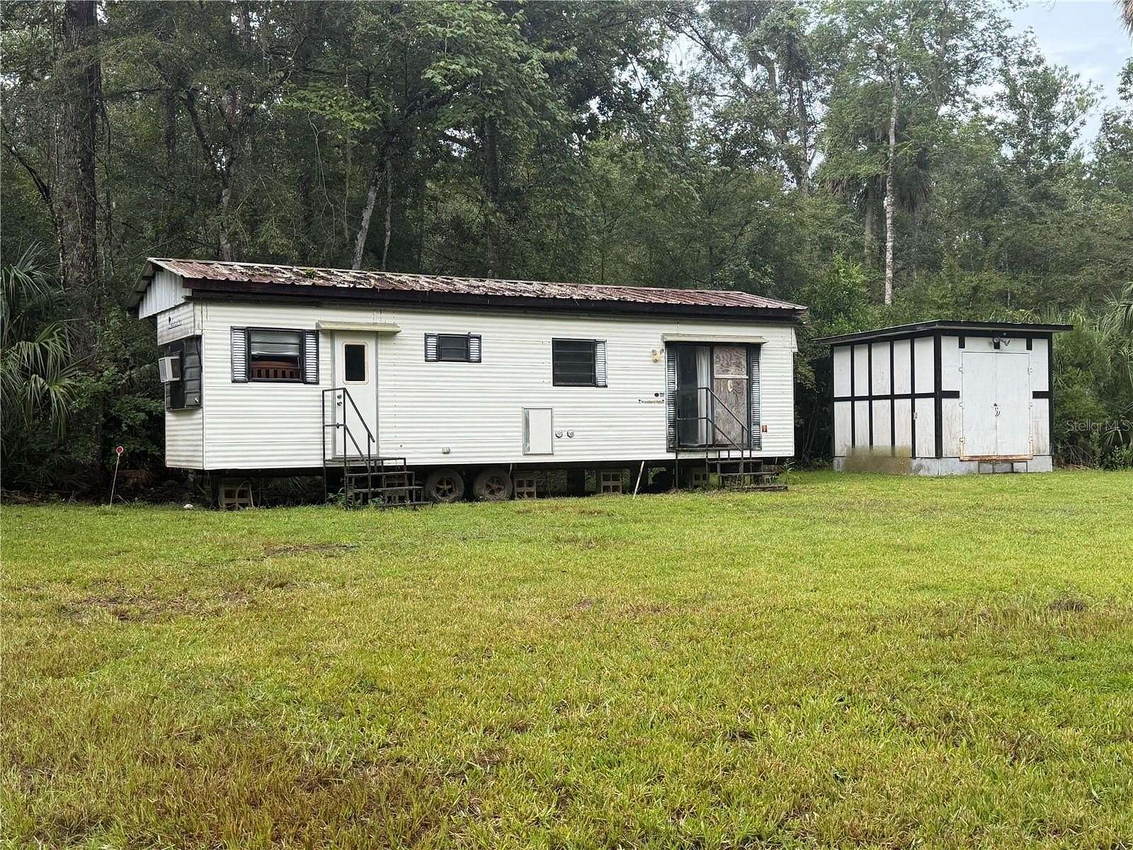 1.8 Acres of Land with Home for Sale in Inglis, Florida