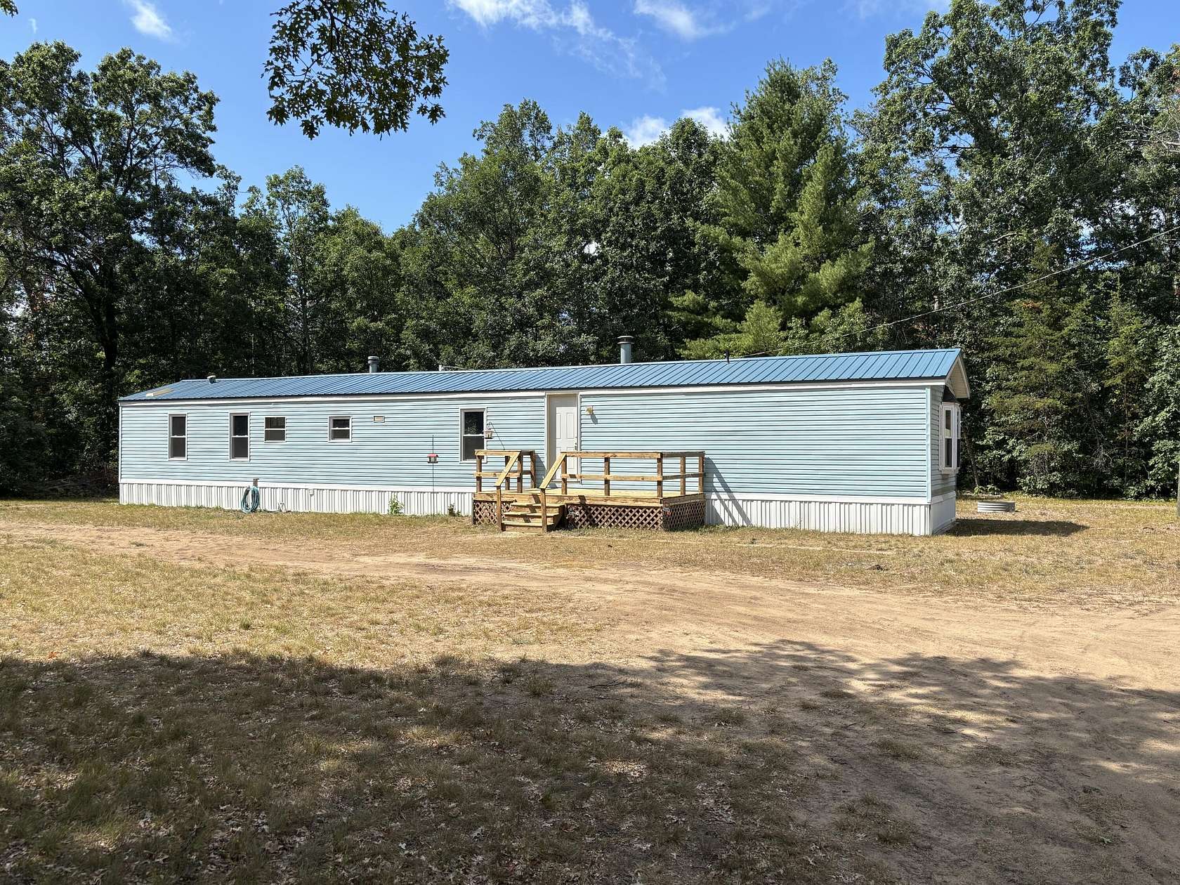 2.5 Acres of Land with Home for Sale in Baldwin, Michigan