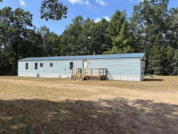 2.5 Acres of Land with Home for Sale in Baldwin, Michigan
