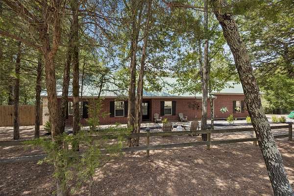 3.1 Acres of Land with Home for Sale in Quinlan, Texas