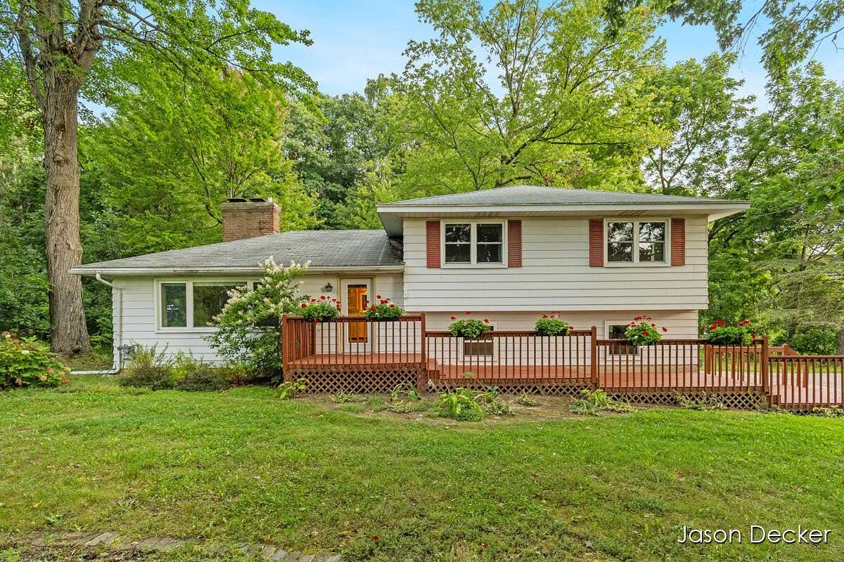 1.67 Acres of Land with Home for Sale in Rockford, Michigan