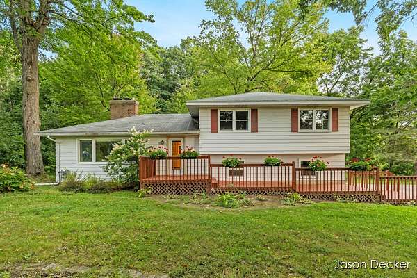 1.67 Acres of Land with Home for Sale in Rockford, Michigan