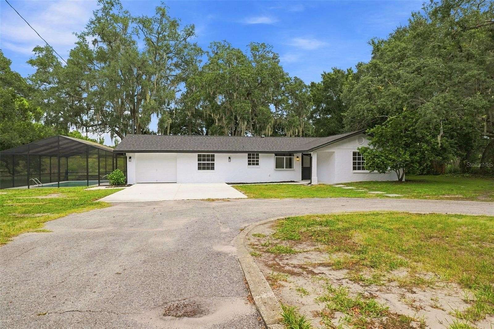 1.65 Acres of Land with Home for Sale in New Port Richey, Florida