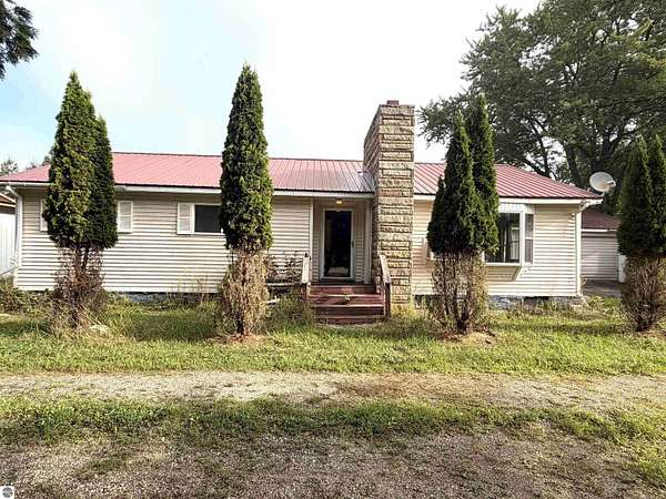 3 Acres of Land with Home for Sale in Elwell, Michigan