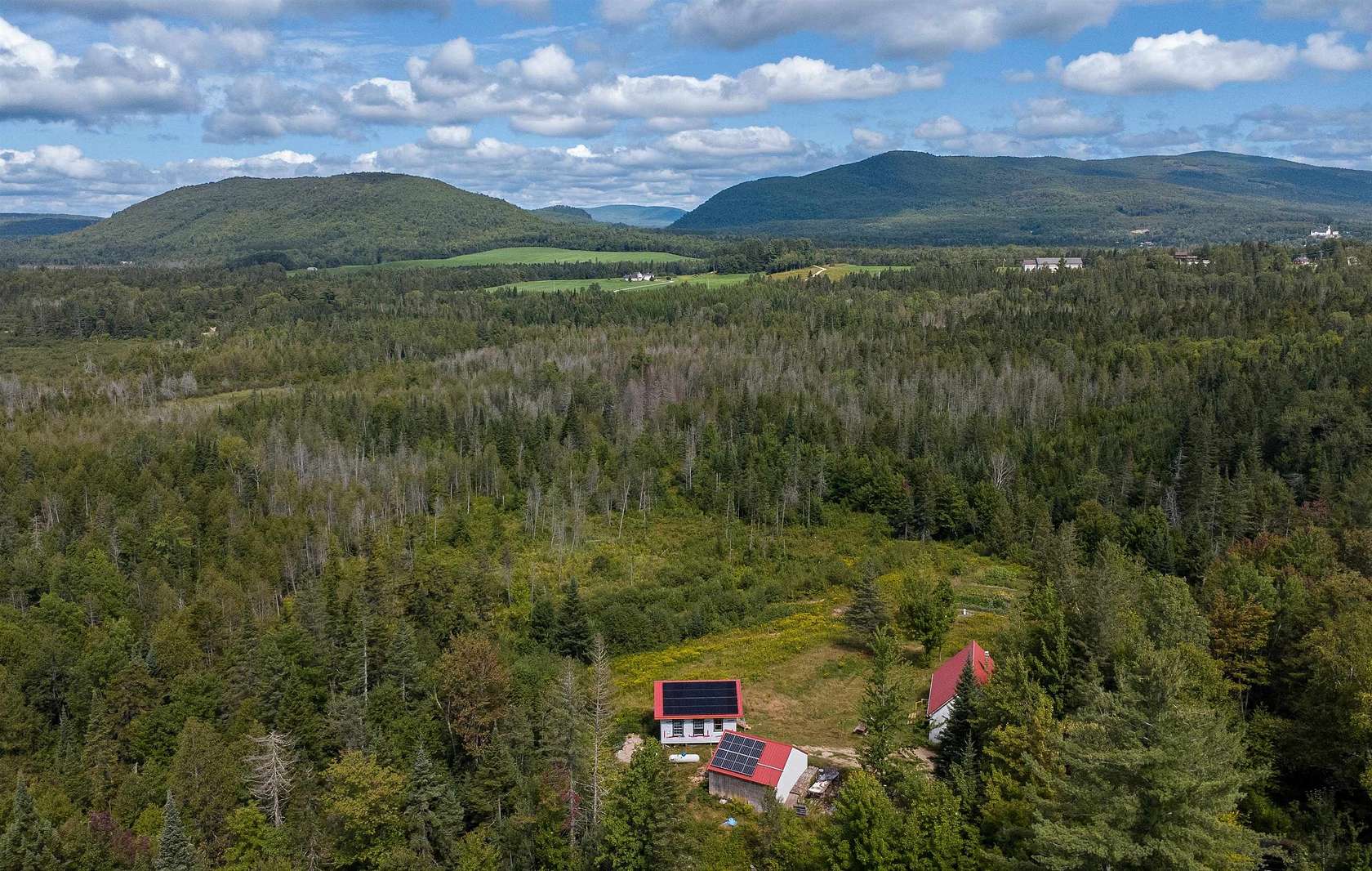 20 Acres of Recreational Land with Home for Sale in Brighton Town, Vermont