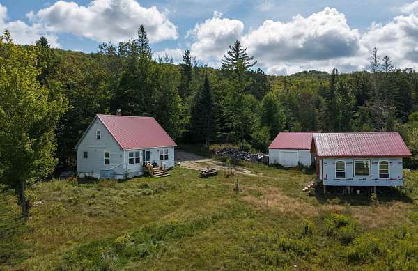 20 Acres of Recreational Land with Home for Sale in Brighton Town, Vermont