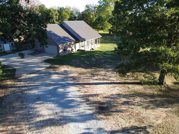 10 Acres of Land with Home for Sale in Marshall, Arkansas