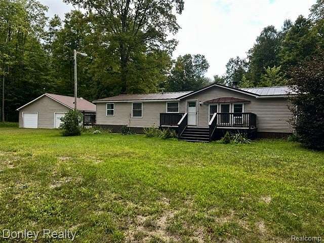 10 Acres of Recreational Land with Home for Sale in Coldsprings Township, Michigan