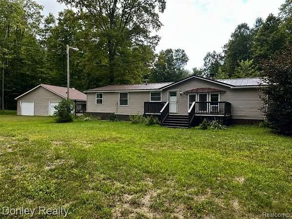 10 Acres of Recreational Land with Home for Sale in Coldsprings Township, Michigan
