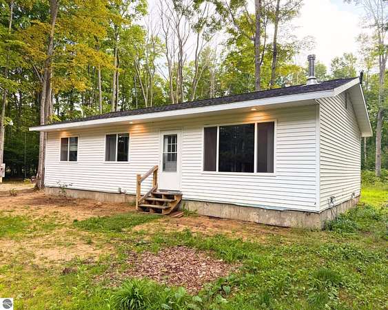 4.83 Acres of Land with Home for Sale in Kalkaska, Michigan