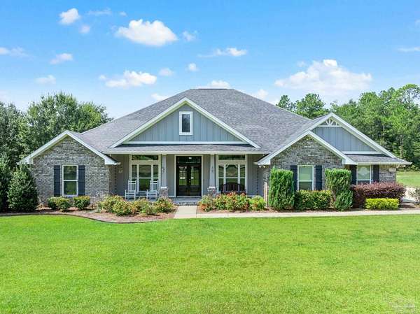 15 Acres of Recreational Land with Home for Sale in Pace, Florida