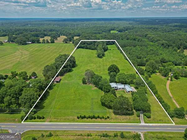 19.6 Acres of Land with Home for Sale in Brooks, Georgia