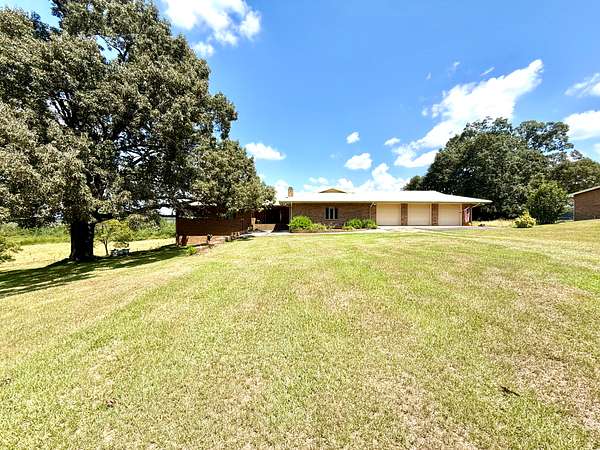 80 Acres of Land with Home for Sale in Clio, Alabama