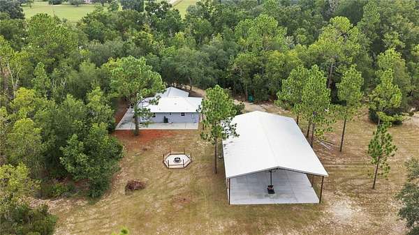 10.9 Acres of Land with Home for Sale in Williston, Florida