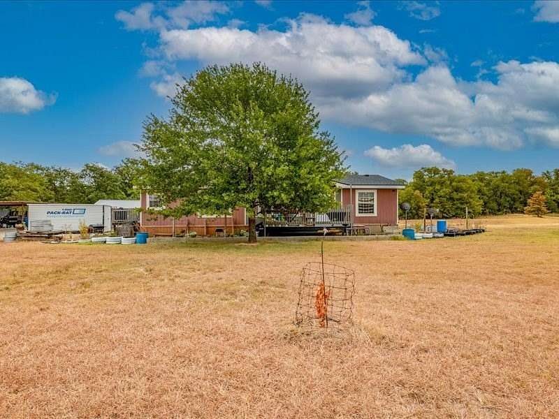 11.2 Acres of Land with Home for Sale in Springtown, Texas