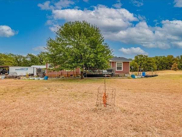 11.2 Acres of Land with Home for Sale in Springtown, Texas