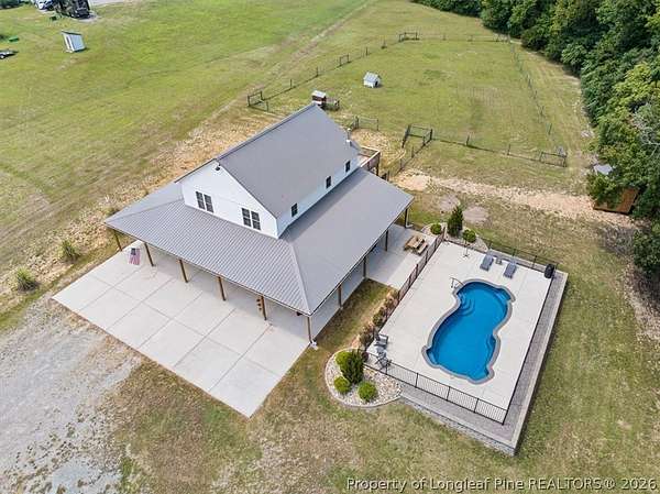 10.5 Acres of Land with Home for Sale in Carthage, North Carolina