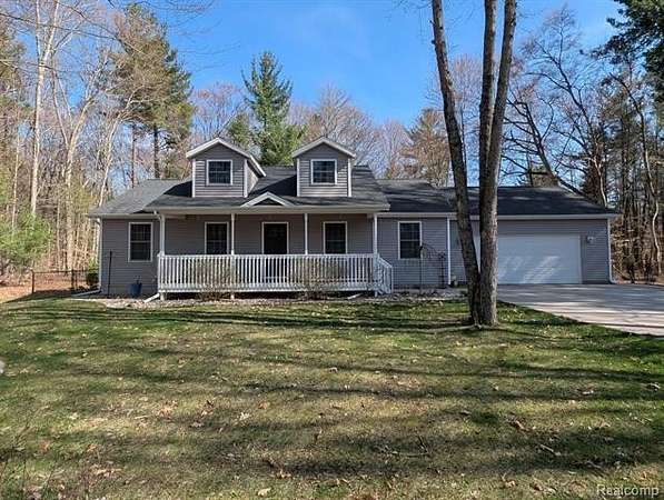 1.56 Acres of Land with Home for Sale in Reynolds Township, Michigan
