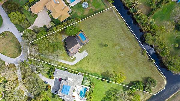 1.56 Acres of Land with Home for Sale in Palm Beach Gardens, Florida