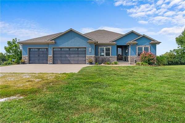 8 Acres of Land with Home for Sale in Peculiar, Missouri