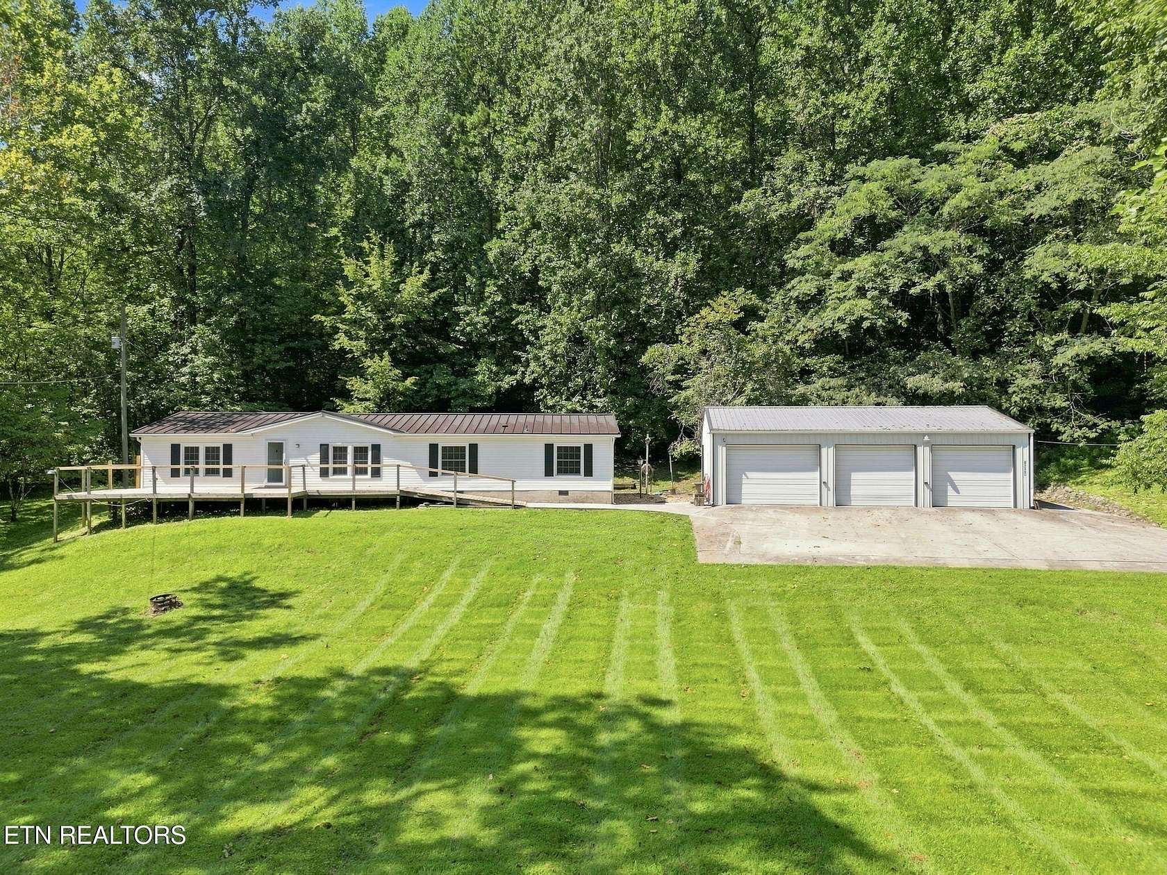 4.63 Acres of Land with Home for Sale in Knoxville, Tennessee