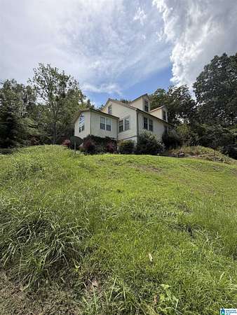 5.39 Acres of Land with Home for Sale in Anniston, Alabama