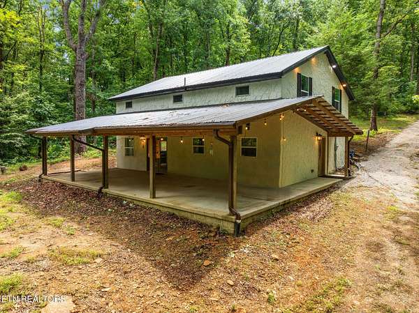 1.55 Acres of Land with Home for Sale in La Follette, Tennessee